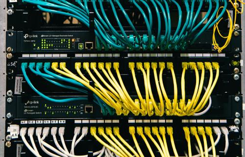 Well organized, multicolored ethernet cables.