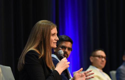lucy talking on a panel