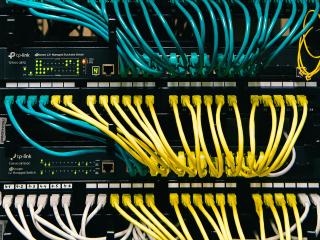 Well organized, multicolored ethernet cables.